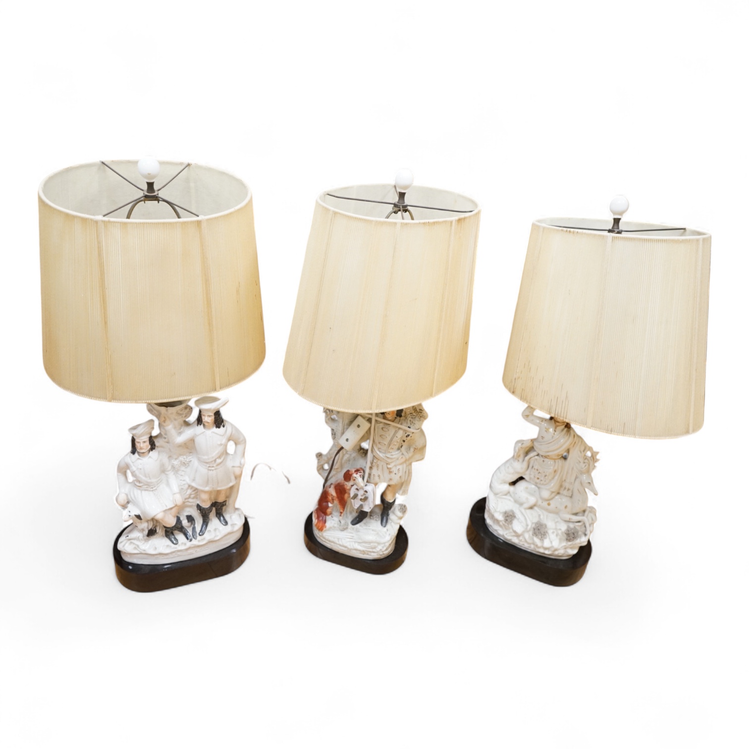 Three Victorian Staffordshire flat back groups, converted and mounted as table lamps, approximately 47cm high